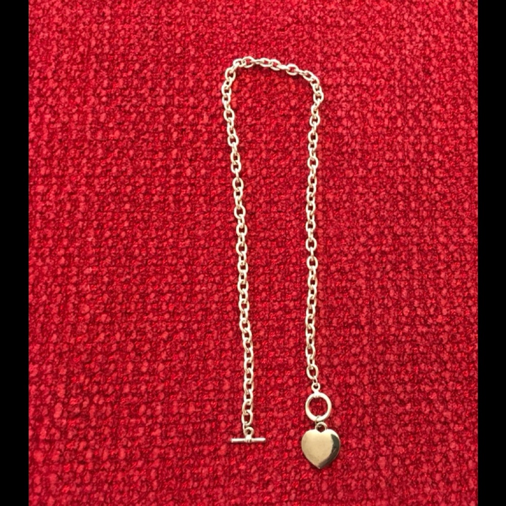 Fun and fashionable.  Silver heart necklace